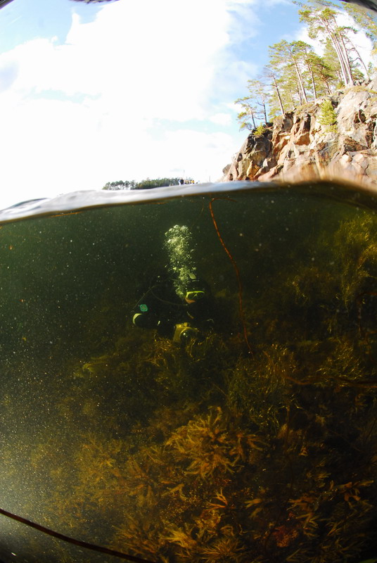 Под водой.